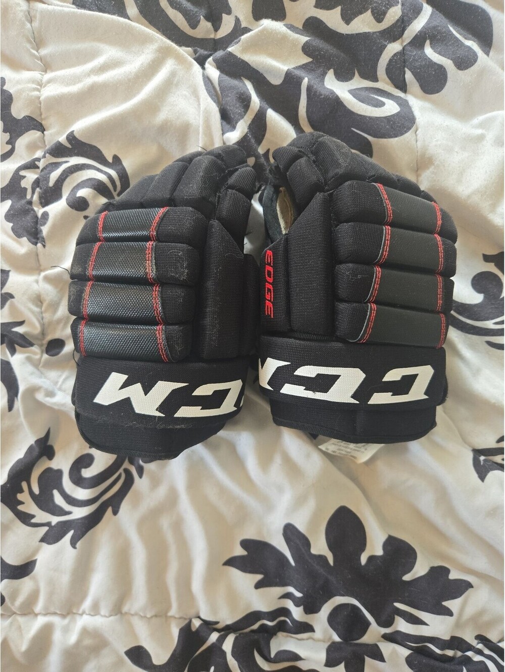 CCM Edge Junior Hockey Gloves Black and Red - Used